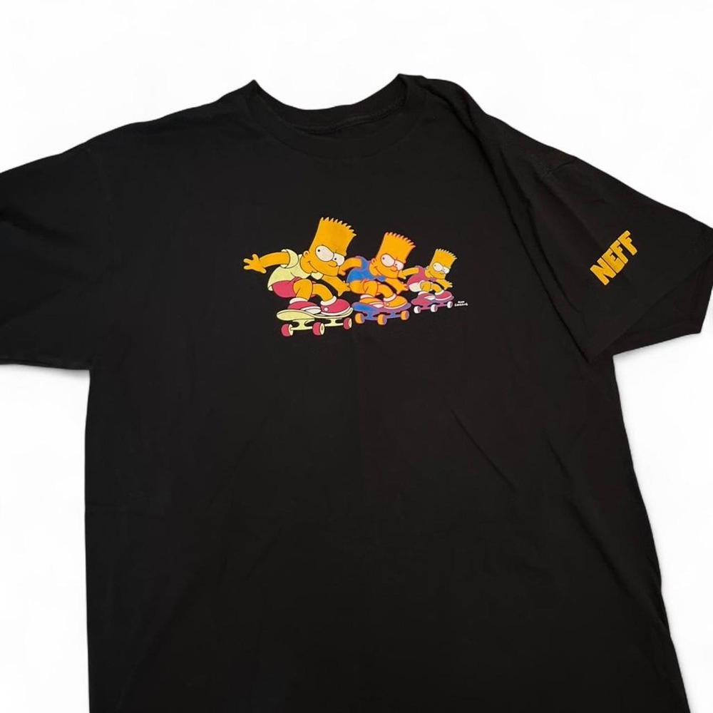 Black & multi-colored Simpsons skateboarding tee